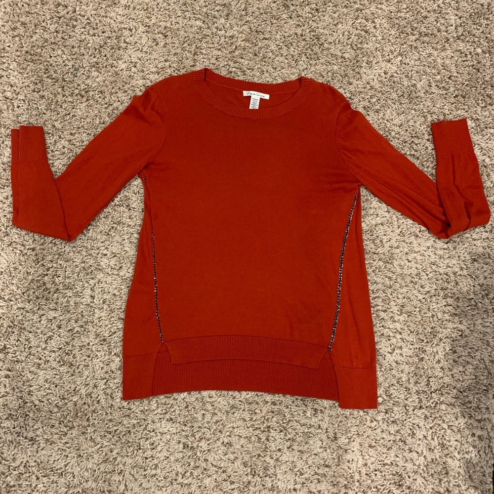 Rust sweater.